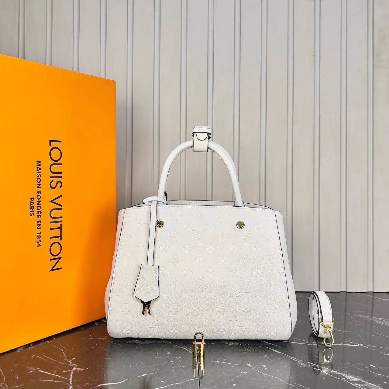 photo_5783007661602753542_y Louis Vuitton Montaigne Bag Medium - Image 1