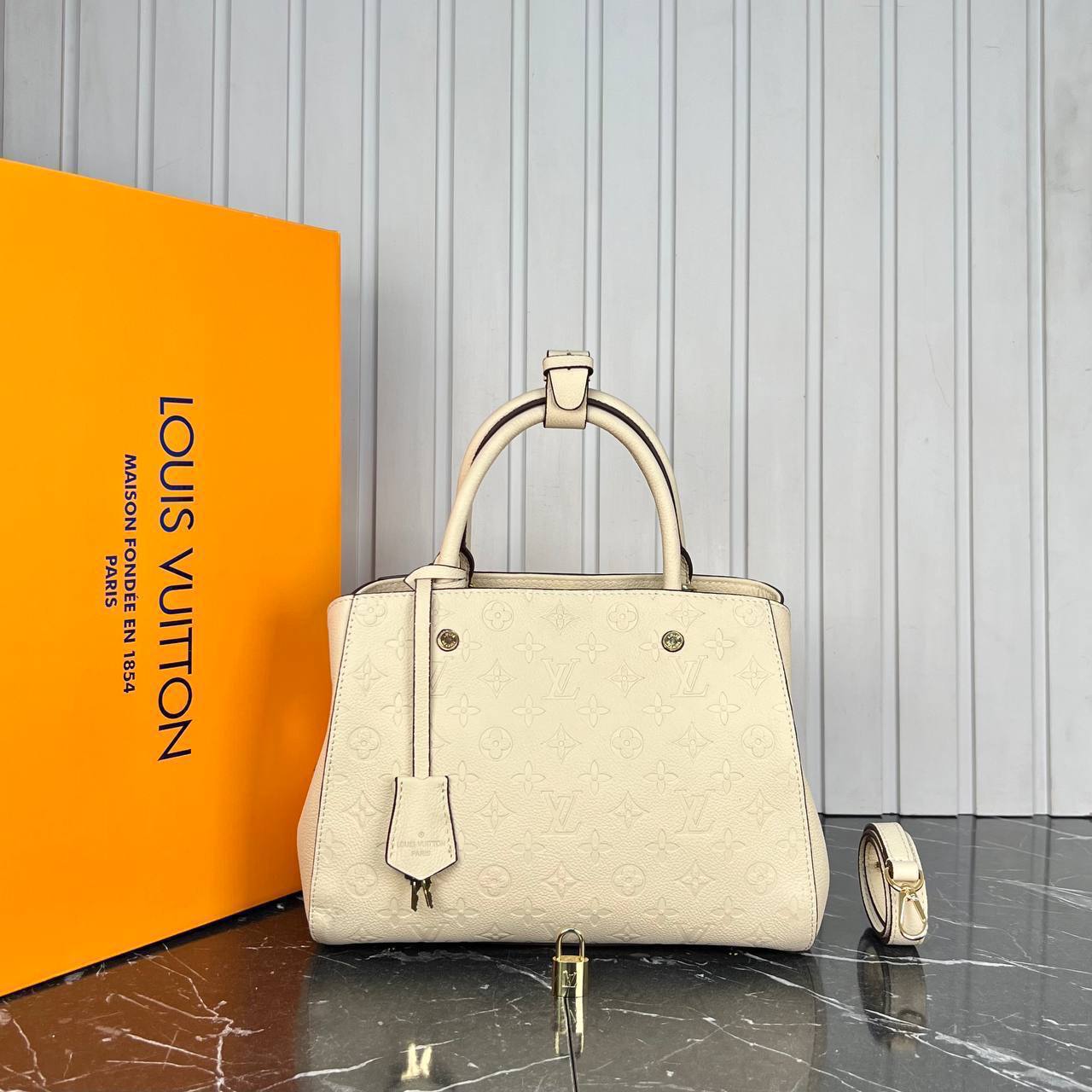 photo_5783007661602753548_y Louis Vuitton Montaigne Bag Medium - Image 1